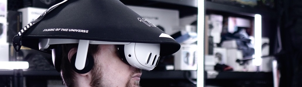 Thomas Voland wearing a VR headset and haptic vest